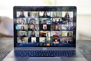 laptop screen showing virtual online meeting