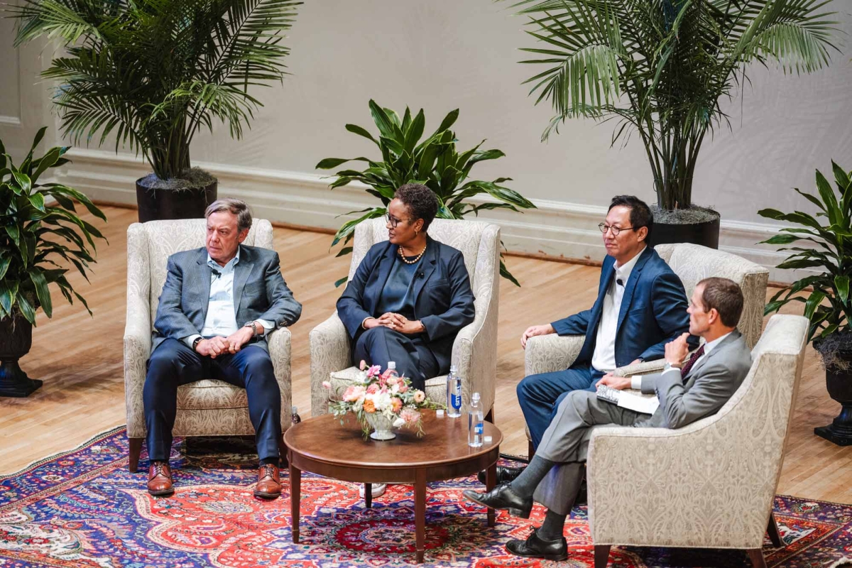 UVA President Jim Ryan sits in a chair along with with the heads of the University of Michigan, Harvey Mudd College and Arizona State University 