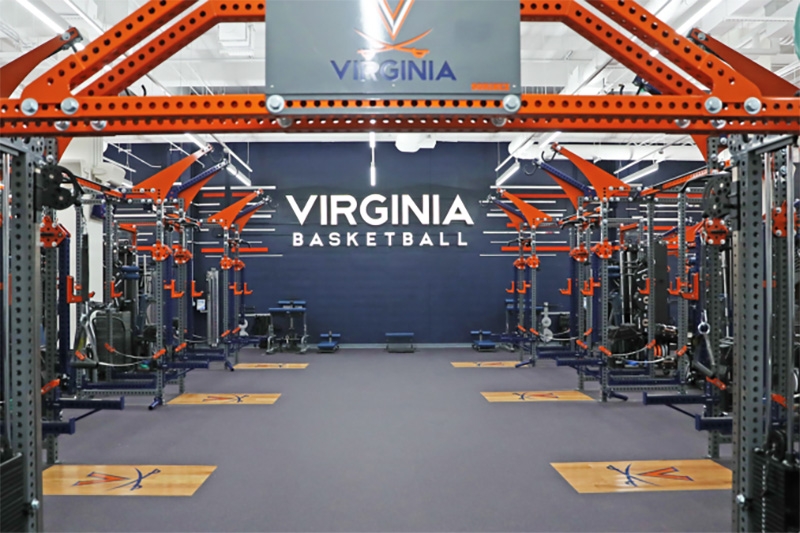 Althletics training room showing rows of weight machines